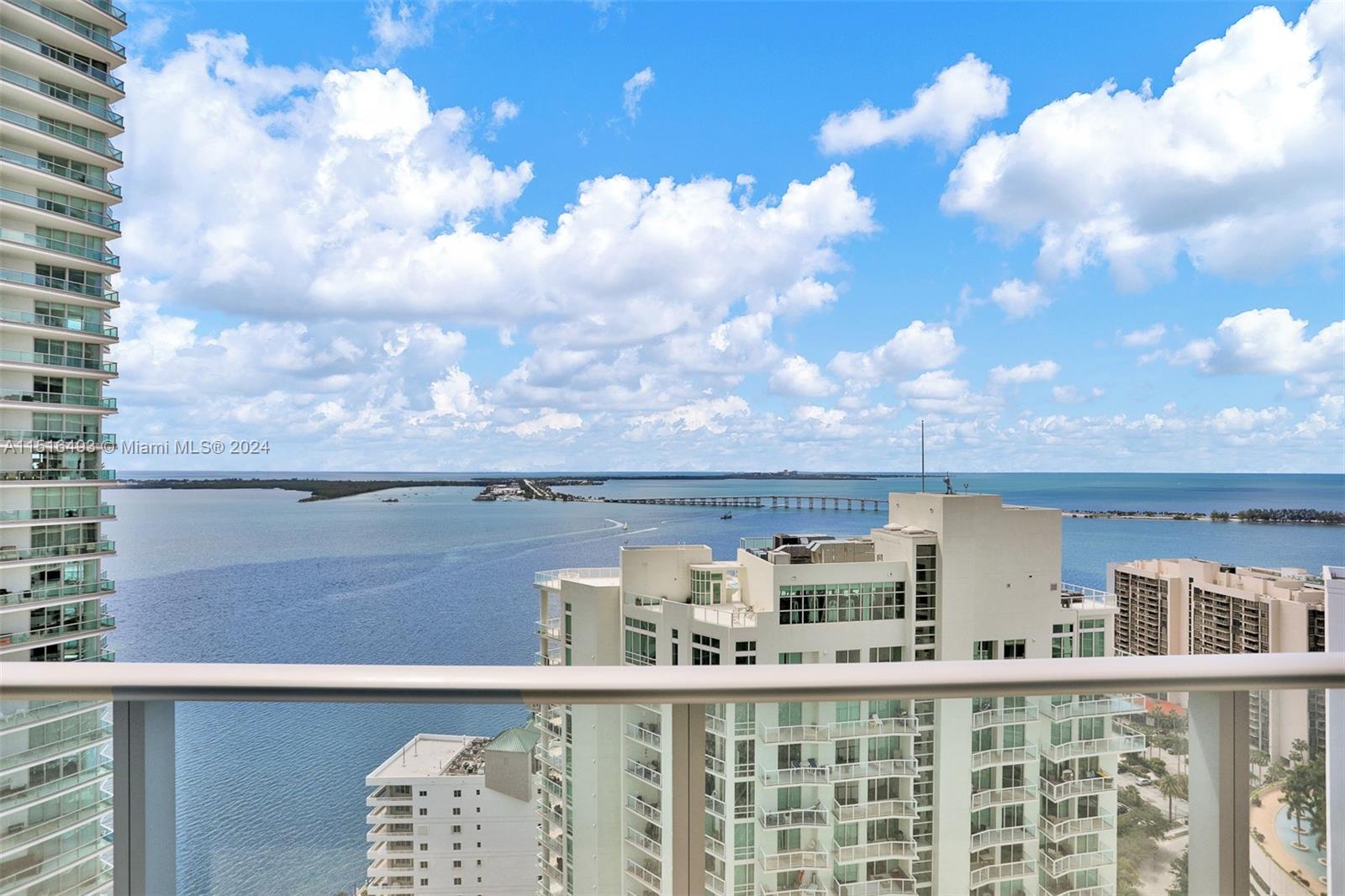 1300 Brickell Bay Drive, Unit 3003 Miami, FL 33131 - Photo 1 of 31 a view of a city with tall buildings