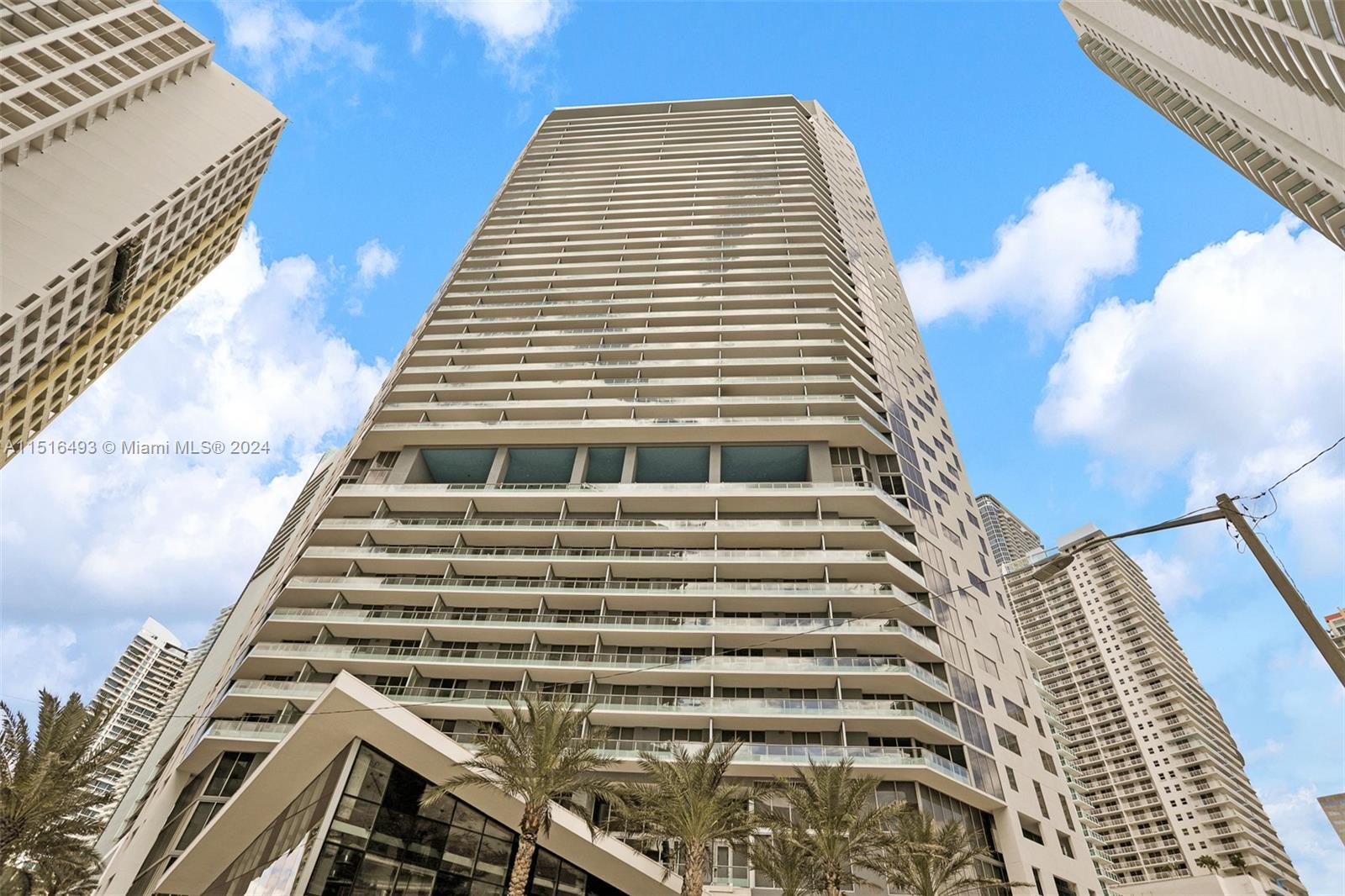 1300 Brickell Bay Drive, Unit 3003 Miami, FL 33131 - Photo 15 of 31 a front view of a multi story building