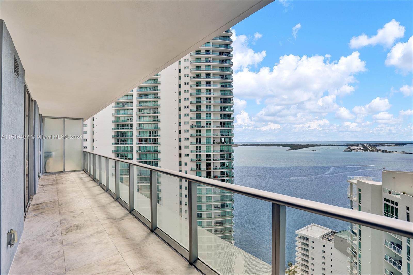 1300 Brickell Bay Drive, Unit 3003 Miami, FL 33131 - Photo 2 of 31 a view of balcony with city view
