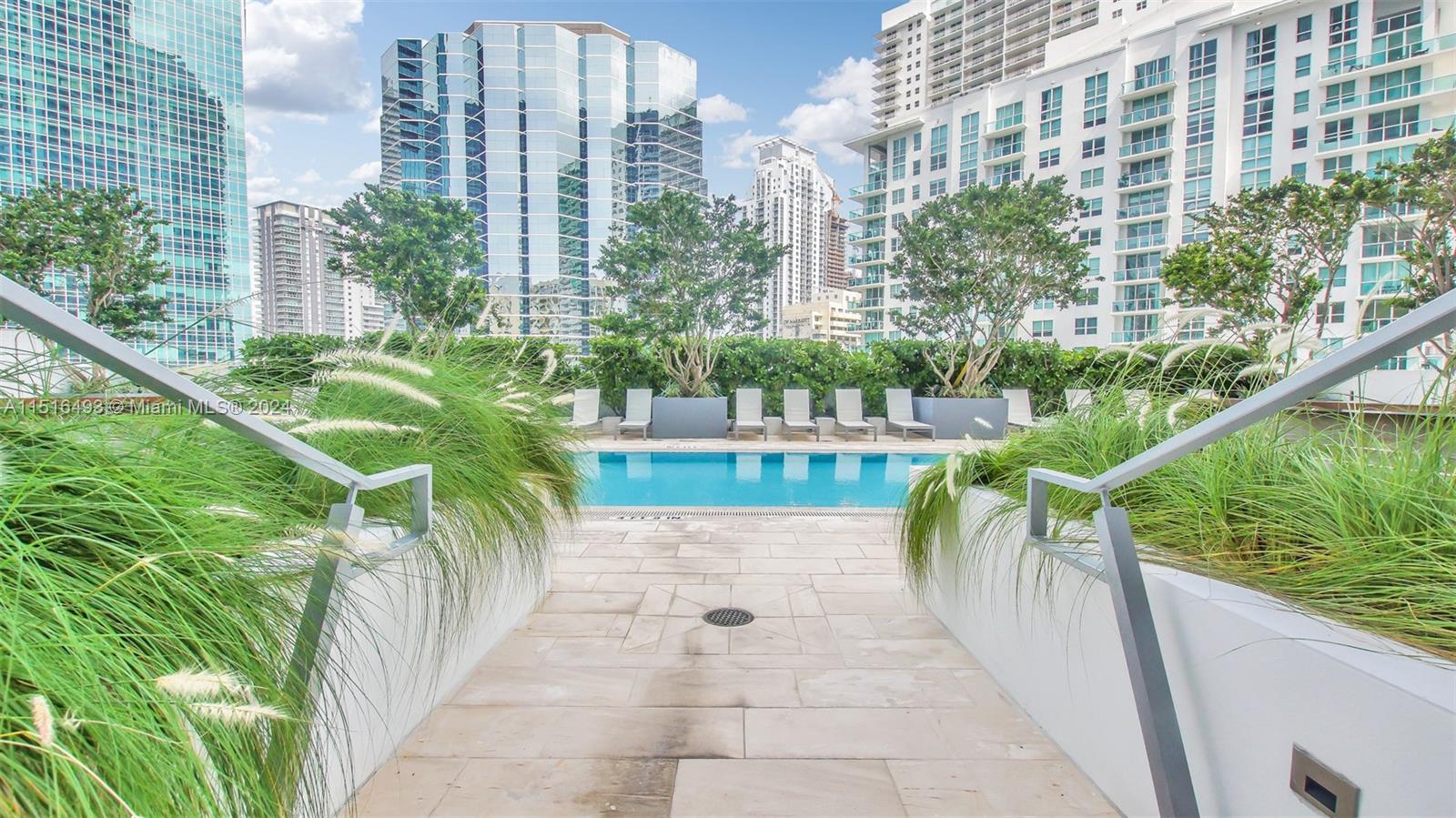 1300 Brickell Bay Drive, Unit 3003 Miami, FL 33131 - Photo 25 of 31 a view of balcony with garden and plants