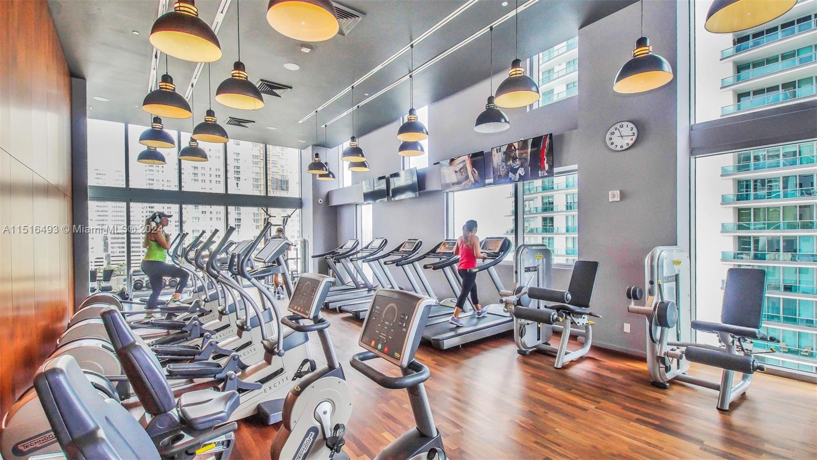 1300 Brickell Bay Drive, Unit 3003 Miami, FL 33131 - Photo 30 of 31 a view of a room with gym equipment