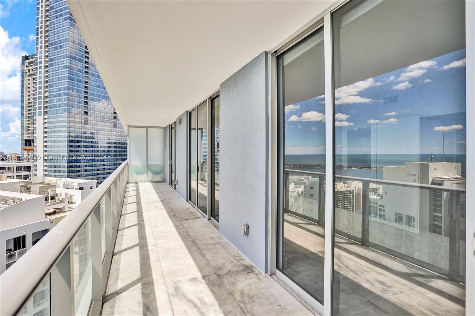 1300 Brickell Bay Drive, Unit 3003 Miami, FL 33131 - Photo 10 of 31 a view of balcony with furniture
