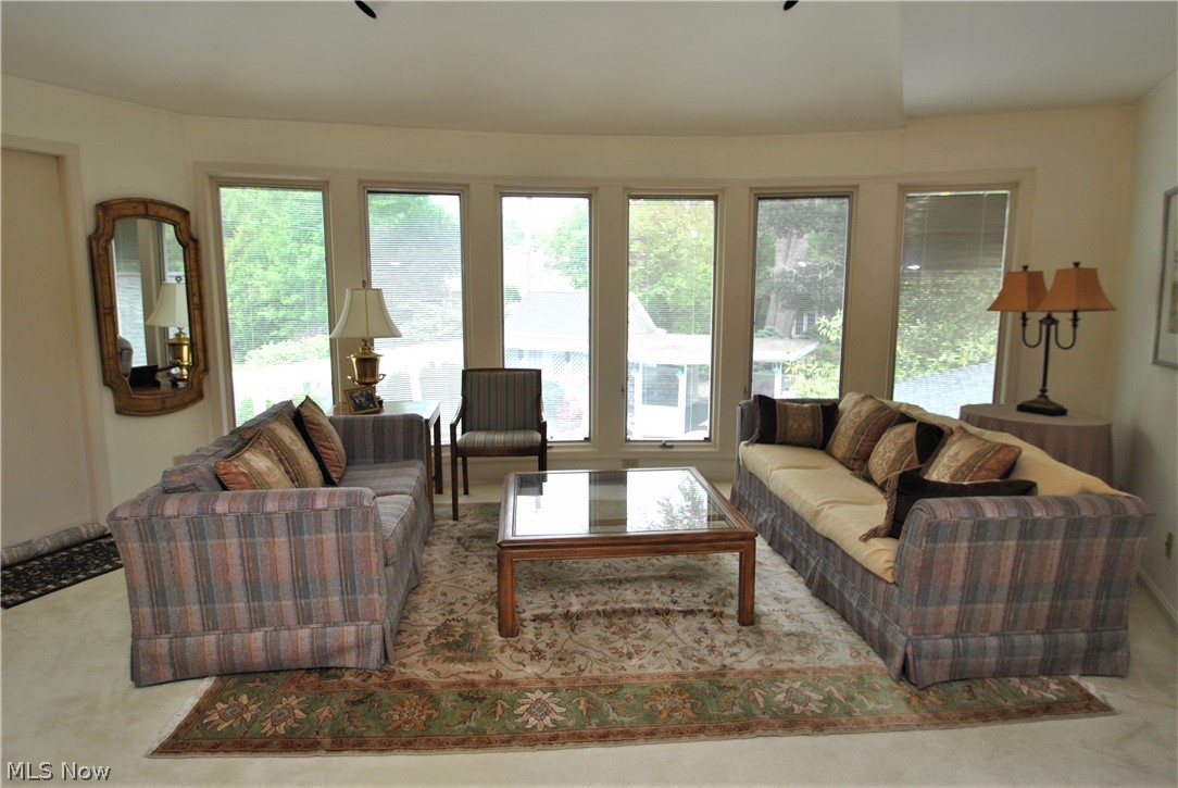 344 Inverness Road Akron, OH 44313 - Photo 16 of 33 Sitting area in master suite has wall of windows overlooking pool & gardens.