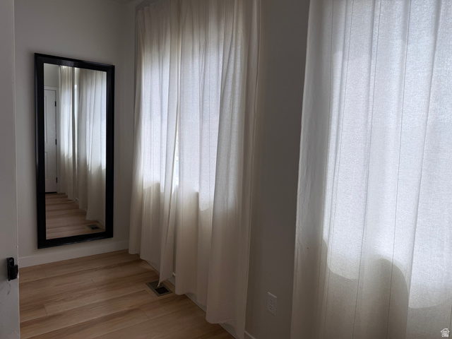 774 West 480 South American Fork, UT 84003 - Photo 49 of 76 Wood-finish flooring with floor-to-ceiling sheer window treatments