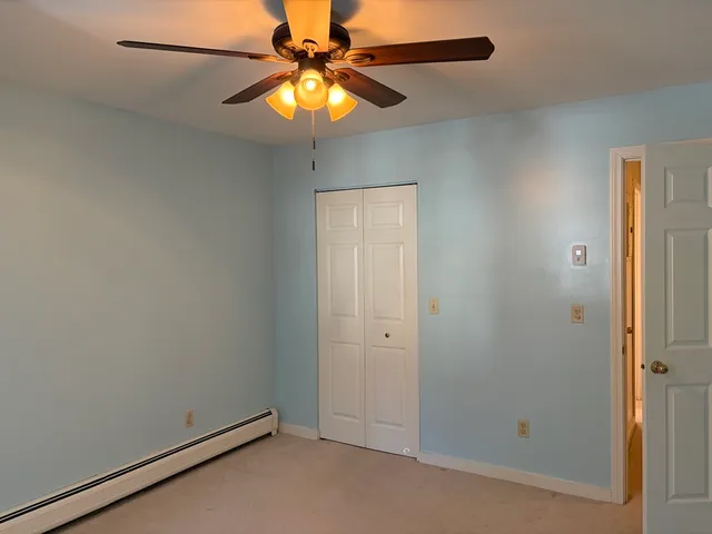 a view of closet area with empty racks