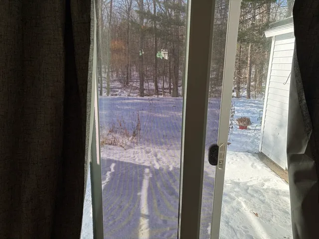 a kitchen with a sink a stove and a refrigerator