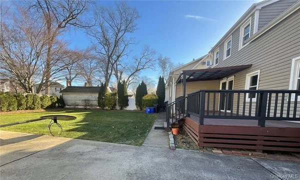 a view of a bench in a yard