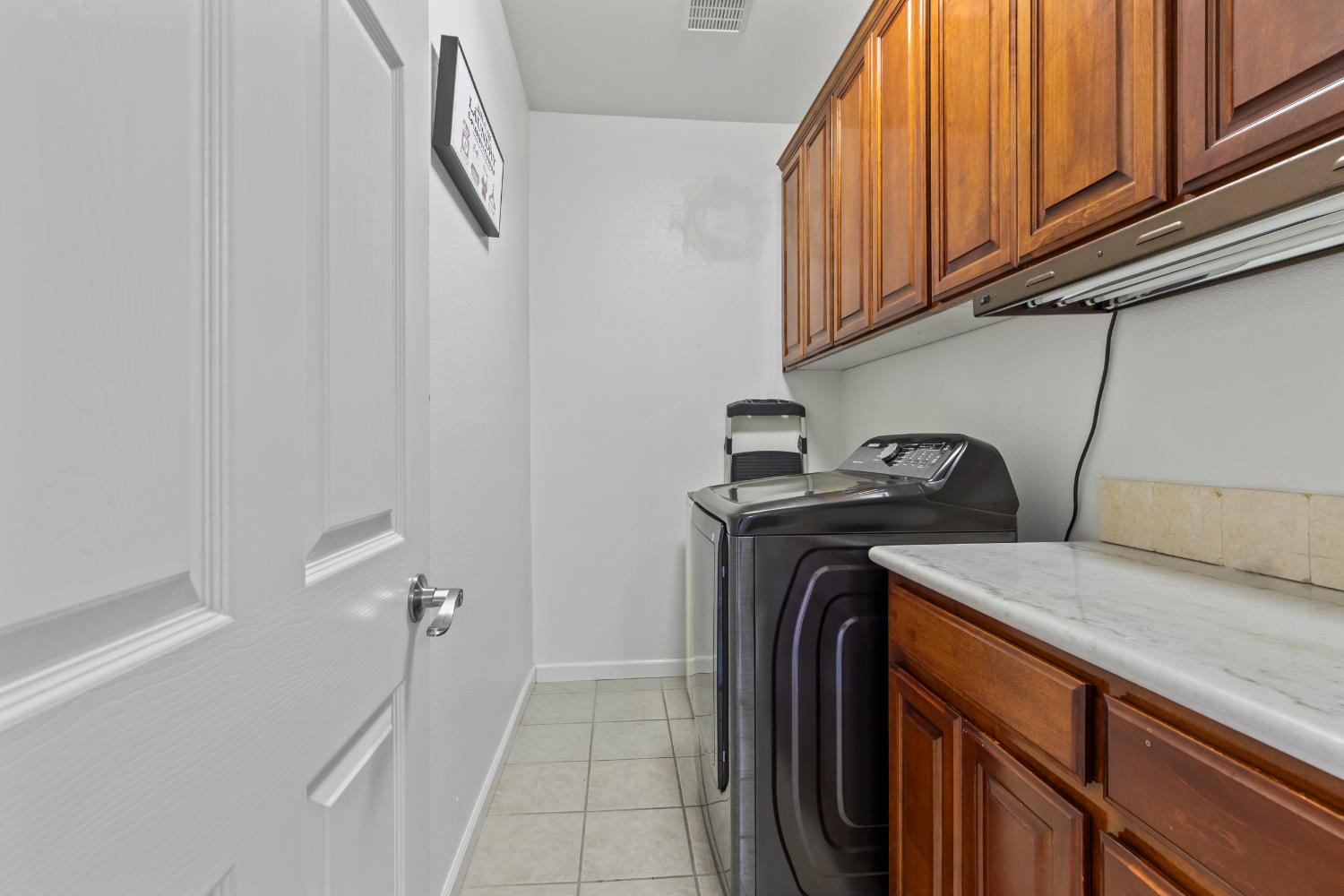 2000 Nita Alexander Court Modesto, CA 95358 - Photo 13 of 33 a utility room with dryer and washer