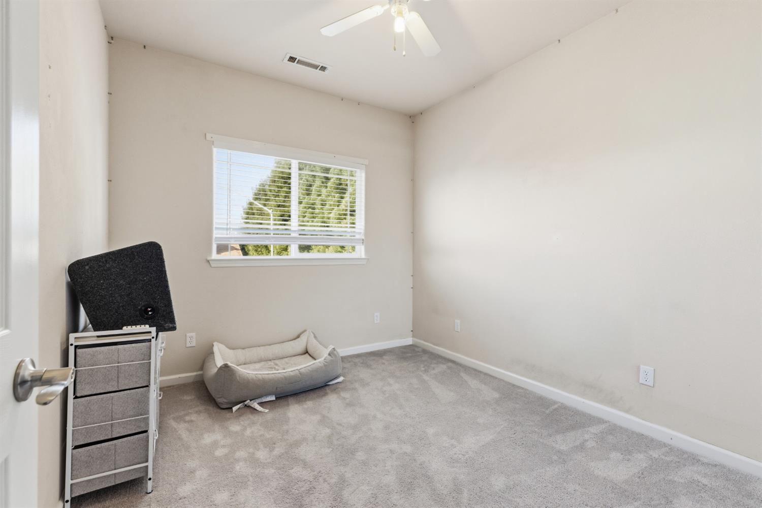 2000 Nita Alexander Court Modesto, CA 95358 - Photo 15 of 33 a living room with furniture and a flat screen tv