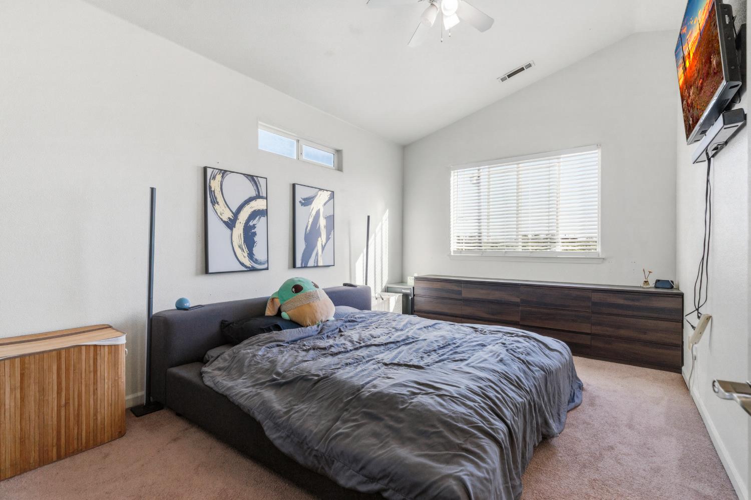 2000 Nita Alexander Court Modesto, CA 95358 - Photo 16 of 33 a bedroom with a bed and wooden floor