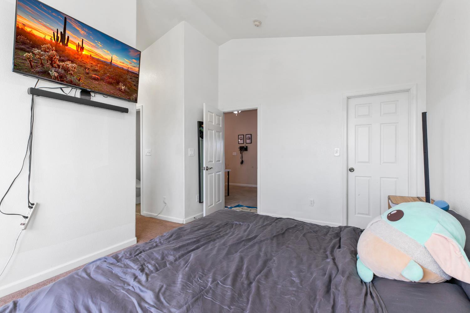 2000 Nita Alexander Court Modesto, CA 95358 - Photo 17 of 33 a bedroom with a bed and a flat screen tv