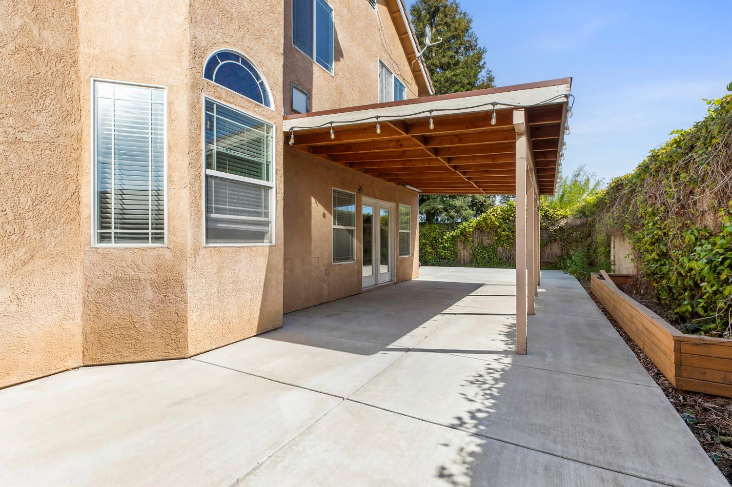 2000 Nita Alexander Court Modesto, CA 95358 - Photo 24 of 33 a view of a porch with a bench