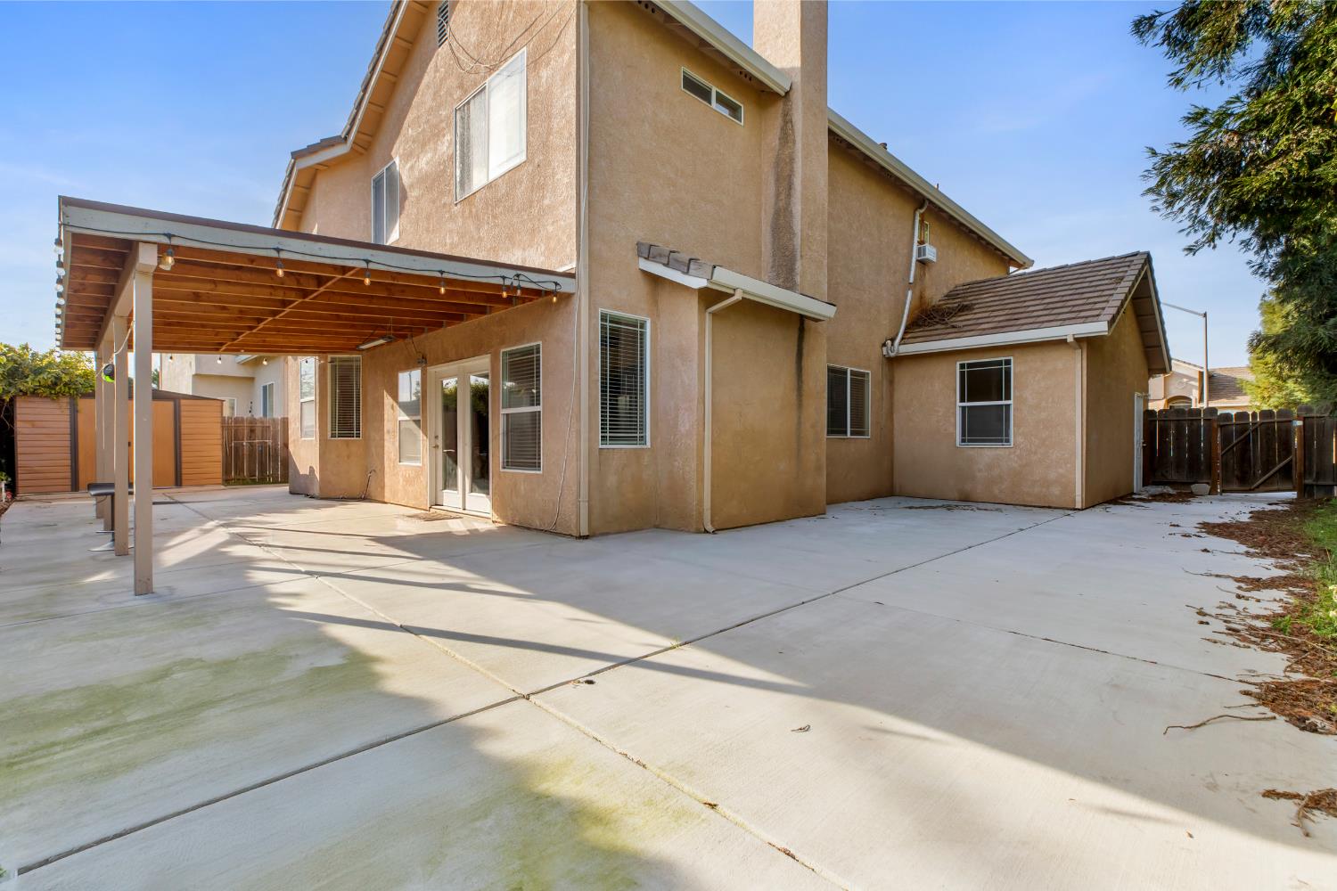 2000 Nita Alexander Court Modesto, CA 95358 - Photo 25 of 33 a view of a house with a backyard