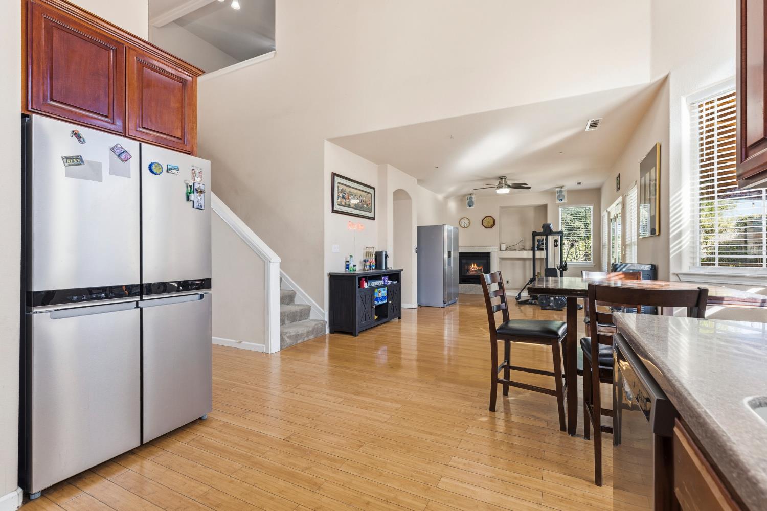 2000 Nita Alexander Court Modesto, CA 95358 - Photo 8 of 33 a living room with furniture wooden floor and a kitchen view