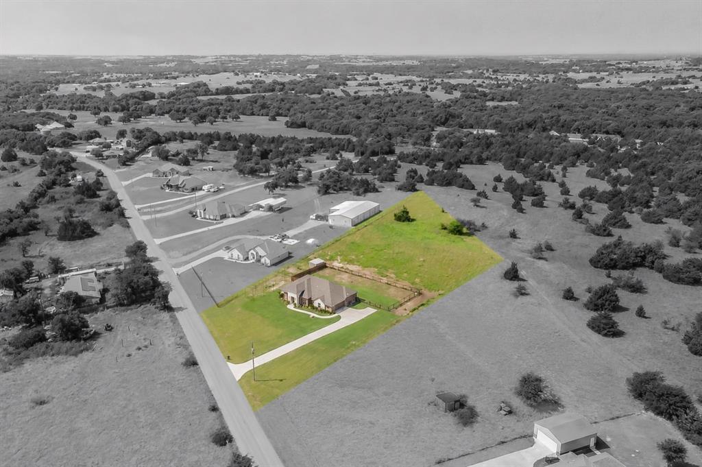 2230 County Road 2360 Decatur, TX 76234 - Photo 2 of 40 This stunning home backs up to a valley that is deed restricted & should never be built on