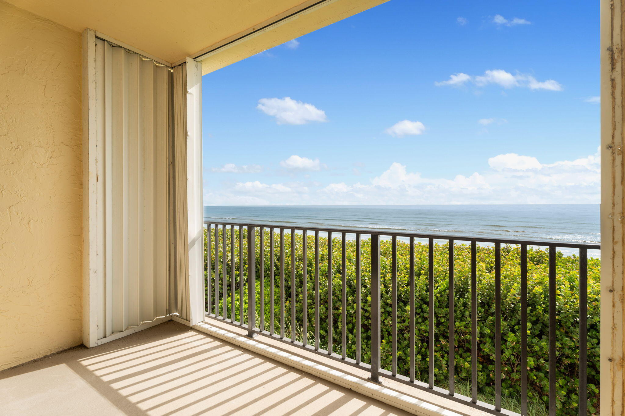 7420 South Ocean Drive, Unit 314 Jensen Beach, FL 34957 - Photo 14 of 24 a view of balcony with wooden floor