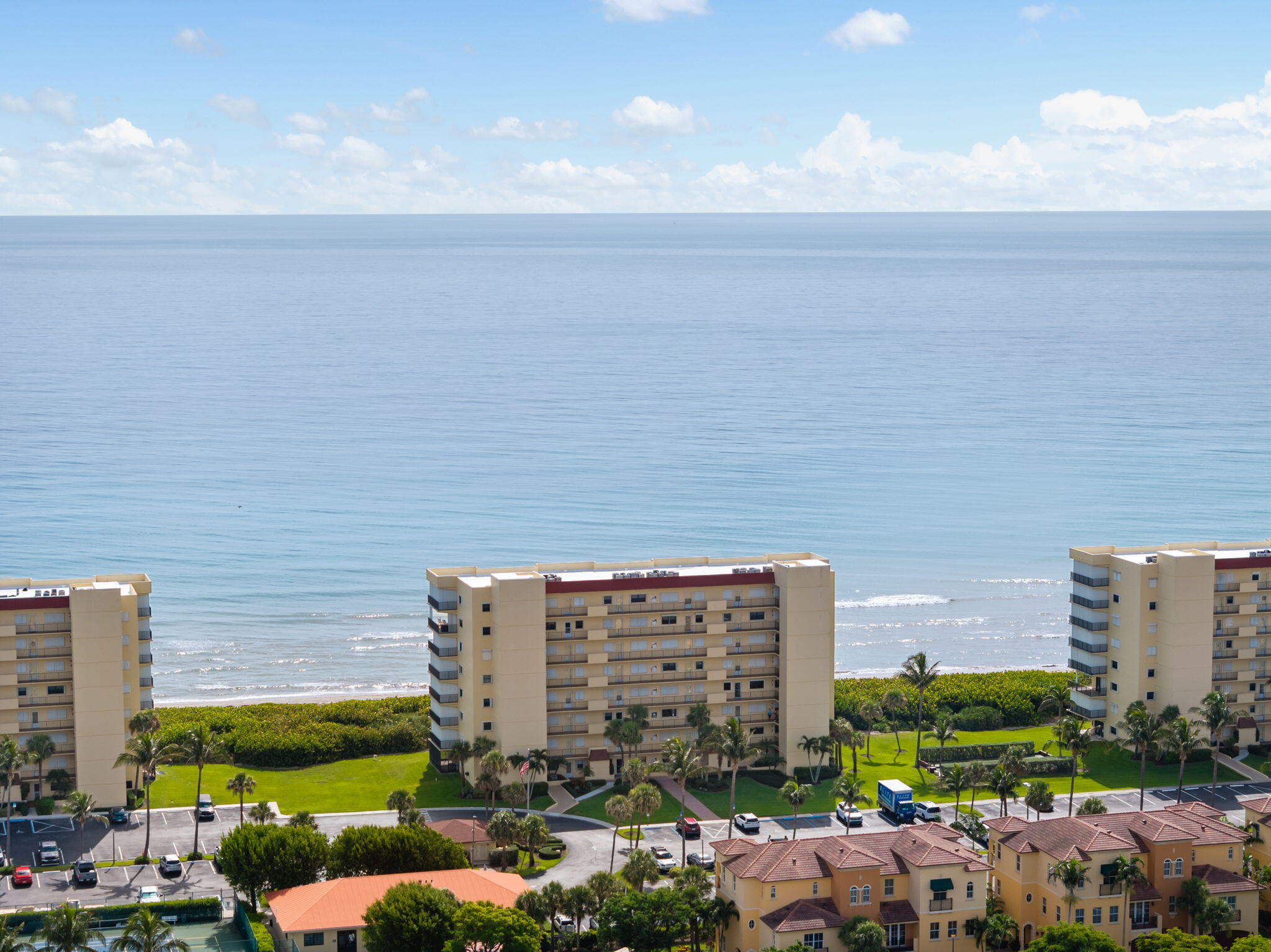 7420 South Ocean Drive, Unit 314 Jensen Beach, FL 34957 - Photo 18 of 24 a view of building with outdoor space