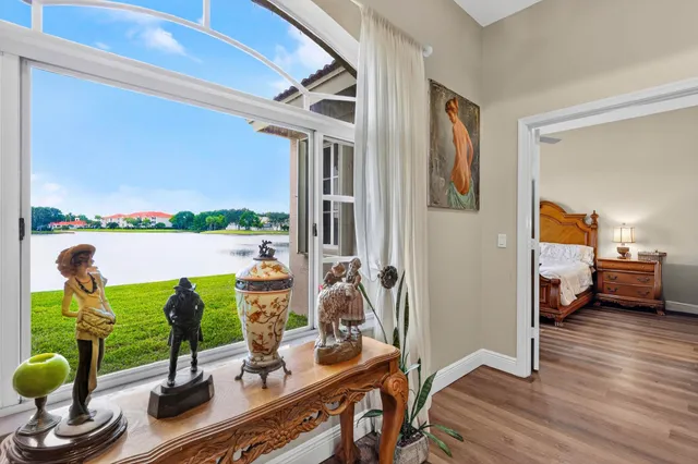 a kitchen with stainless steel appliances granite countertop a stove microwave and refrigerator