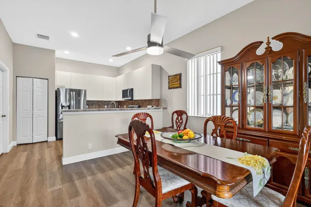a white bath tub sitting next to a window
