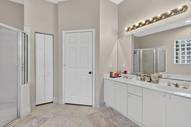 a bed room with a bed and a tv