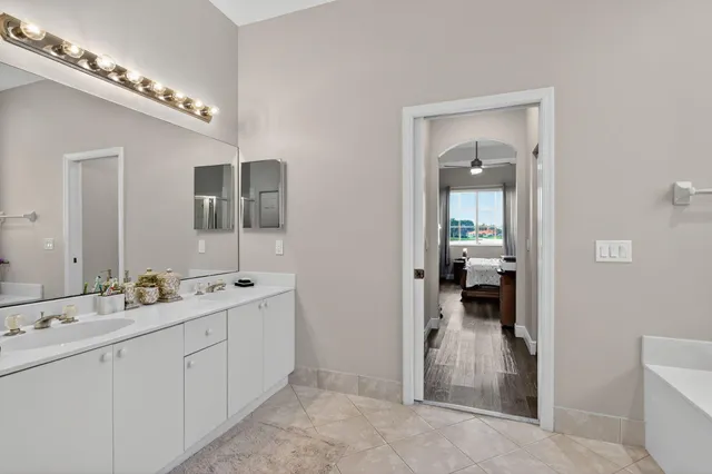 a view of a workspace with furniture and wooden floor