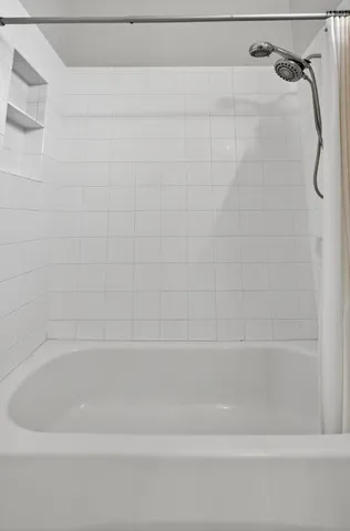 a view of statue in a garden