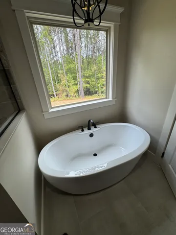 a bathroom with a sink and a bathtub