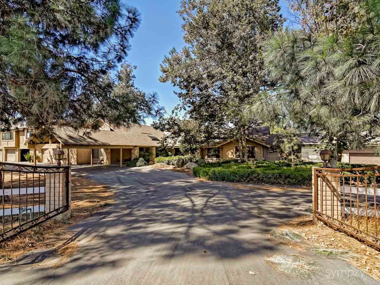 28114 Queensbridge Road Valley Center, CA 92082 - Photo 1 of 25 Gated Driveway - Front & Rear Gates