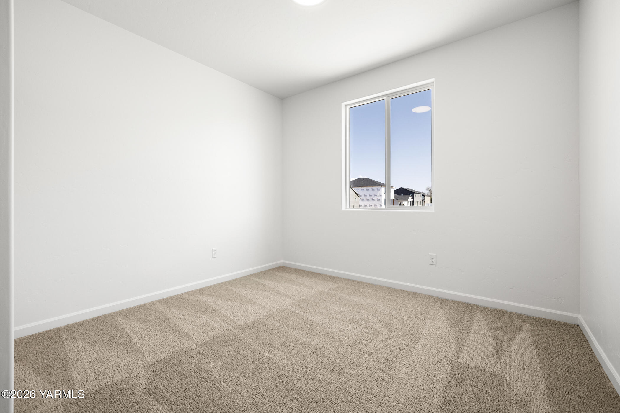 313 Amberly Avenue Grandview, WA 98930 - Photo 13 of 18 a view of an empty room