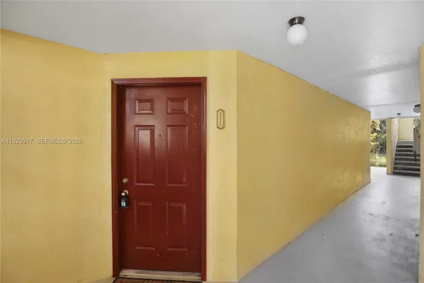 a view of a hallway with closet