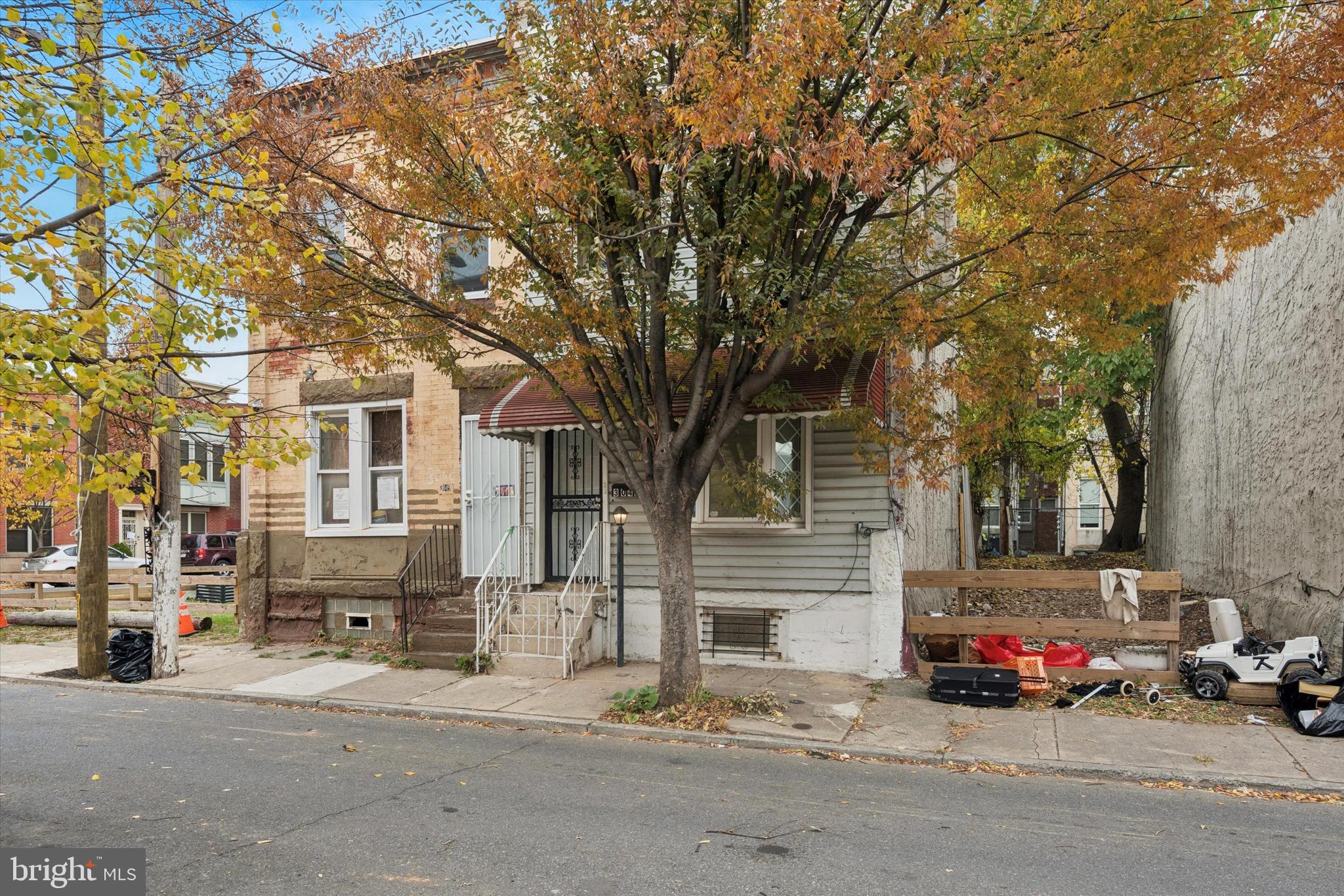 3047 Fontain Street Philadelphia, PA 19121 - Photo 1 of 15 a view of a street with cars