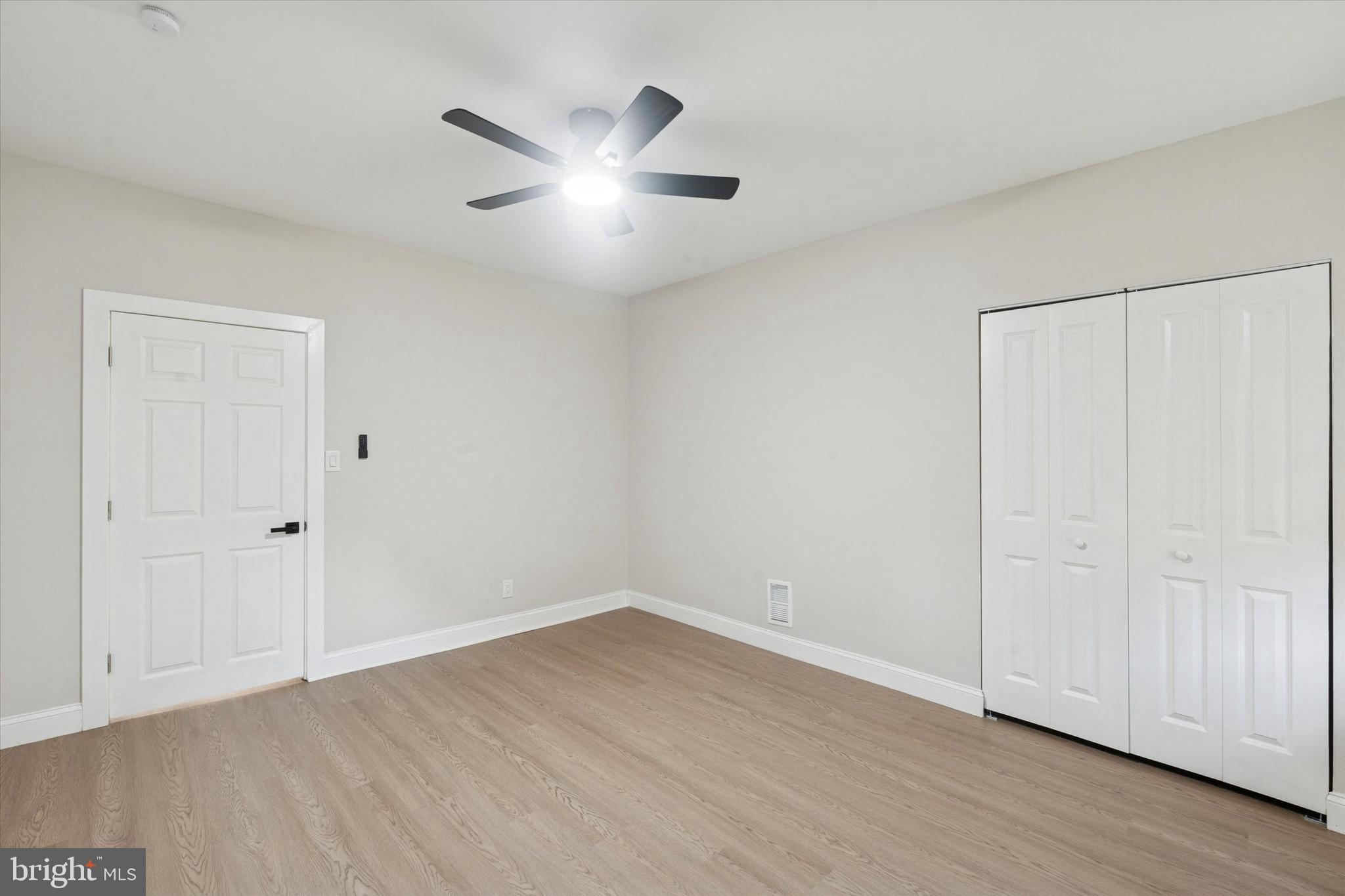 3047 Fontain Street Philadelphia, PA 19121 - Photo 12 of 15 a view of an empty room with wooden floor