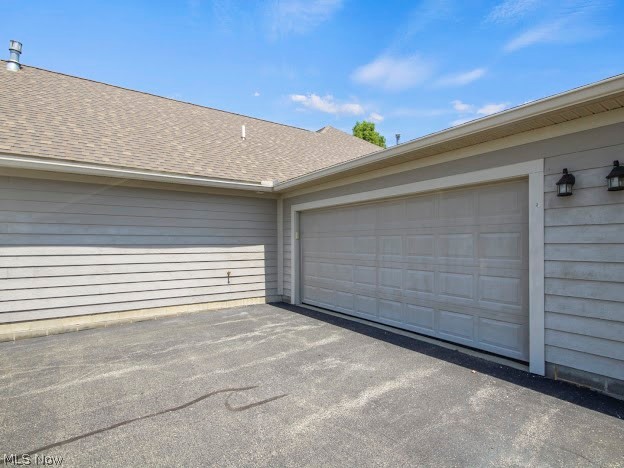 9151 Springfield Road, Unit 1201 Youngstown, OH 44514 - Photo 22 of 22 View of garage