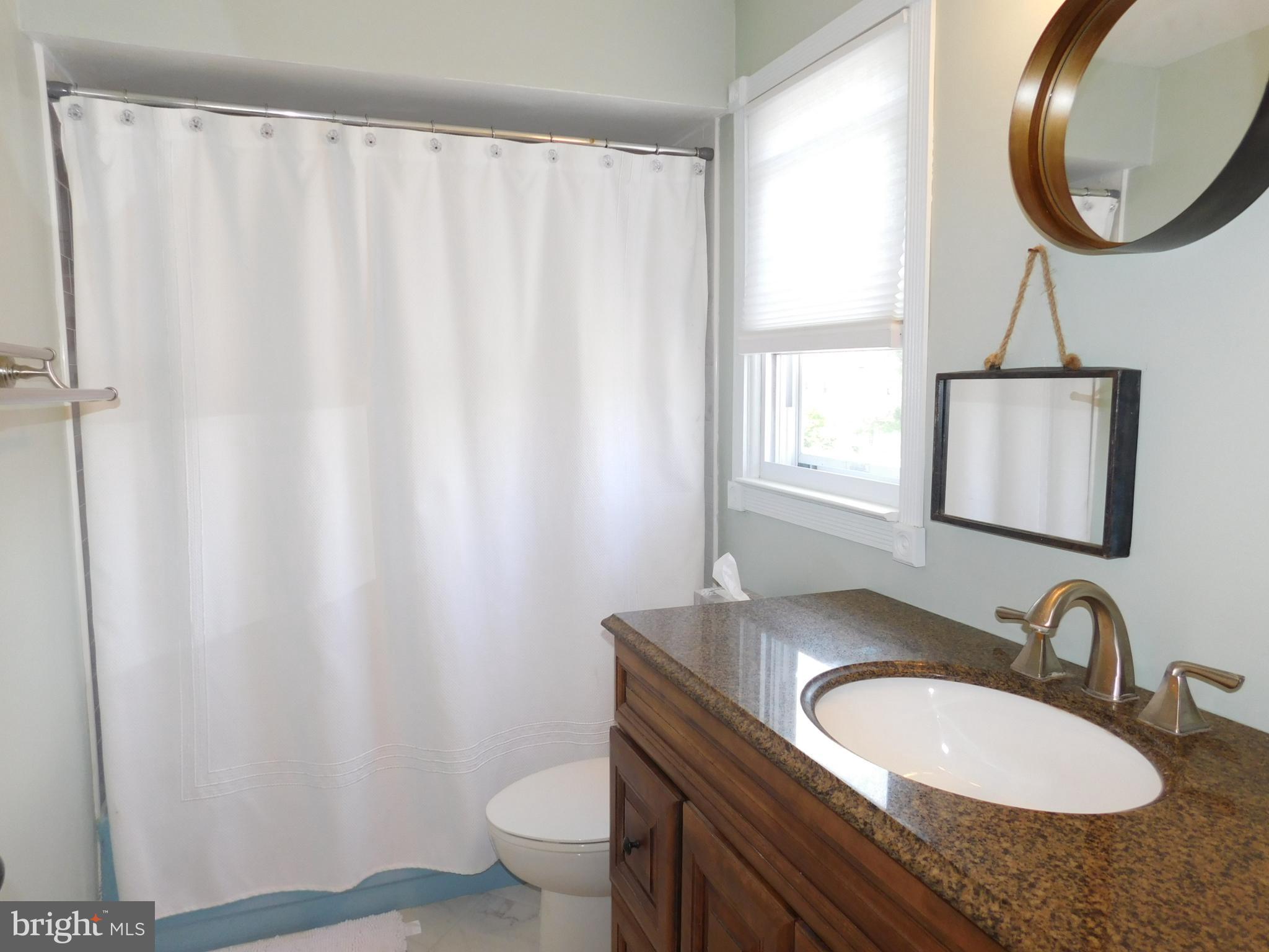 33 Champlain Road Marlton, NJ 08053 - Photo 26 of 45 Hall bathroom with newer vanity and tile