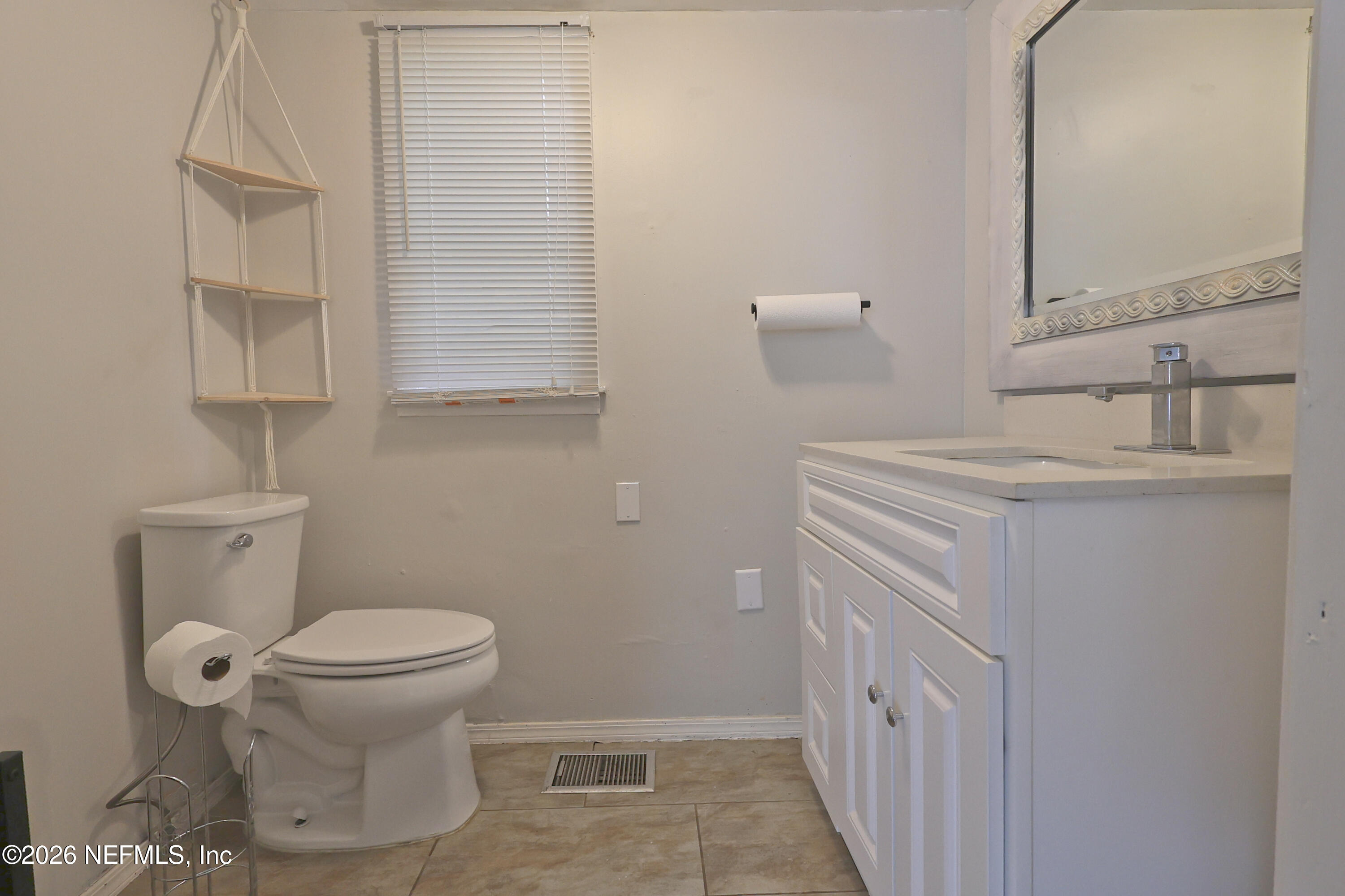 7448 Clinton Street Jacksonville, FL 32208 - Photo 21 of 43 office bathroom
