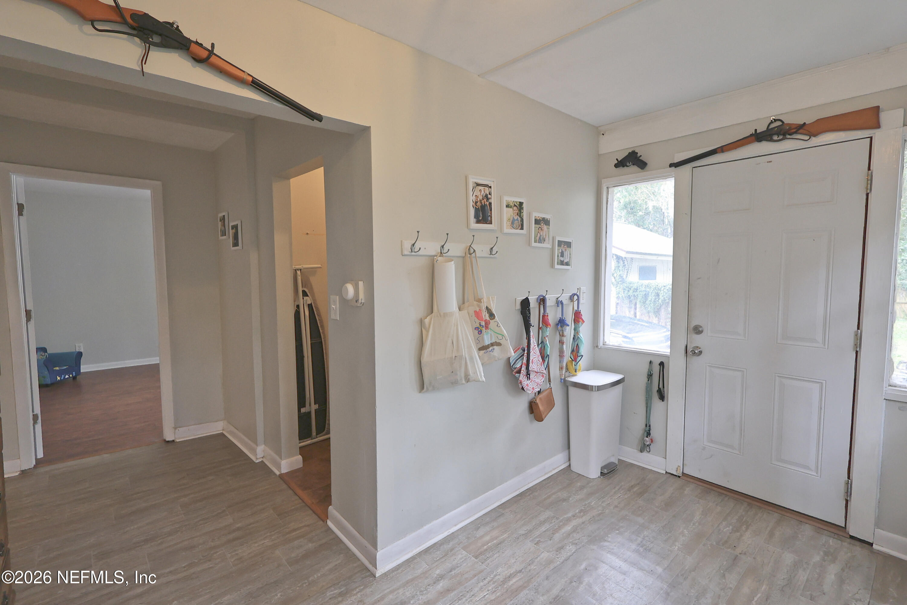 7448 Clinton Street Jacksonville, FL 32208 - Photo 33 of 43 mudroom/rear door