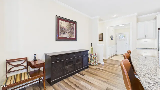 a white stove top oven sitting inside of a kitchen