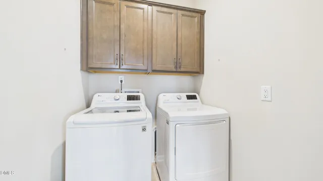 a bathroom with a granite countertop sink a mirror and a shower