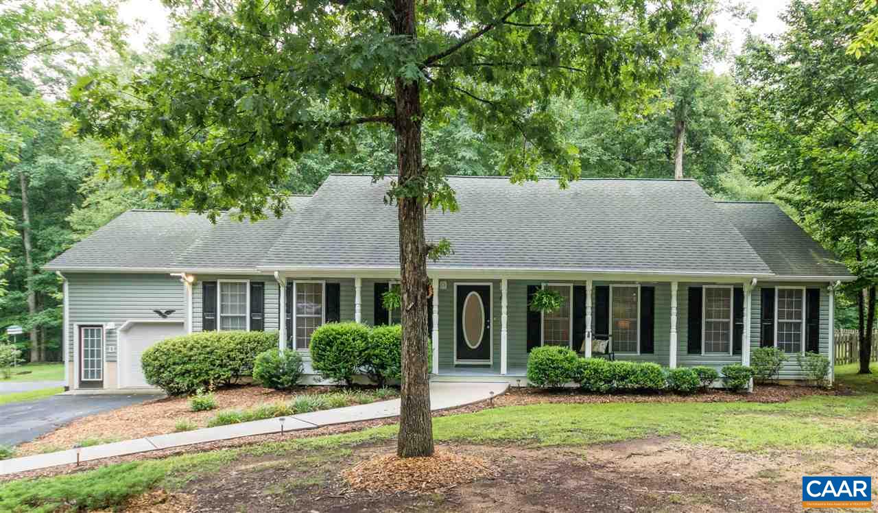 Gorgeous ranch home, lovely landscaped lawn, full country front porch!