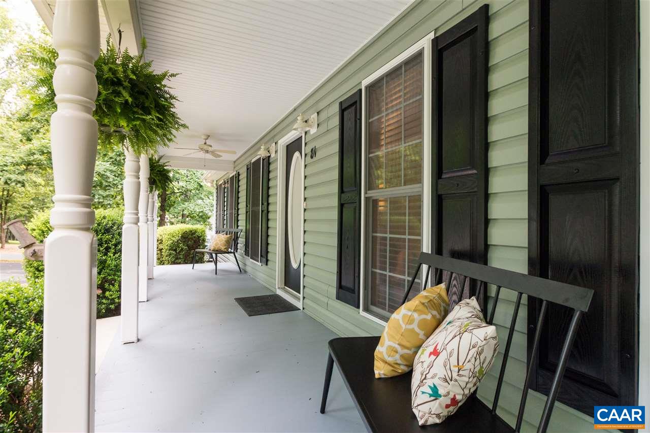 A lovely front porch, ceiling fans keep air moving !