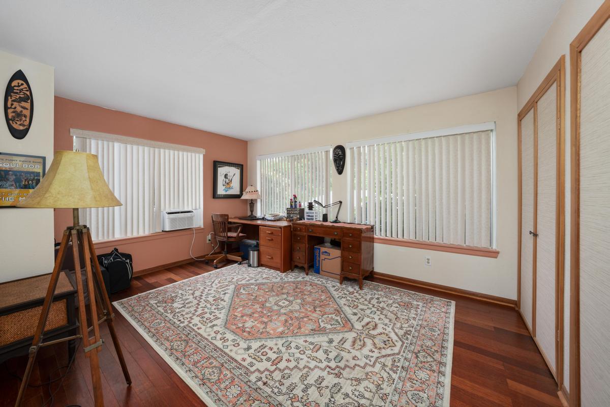 85-4563 Hawaii Belt Road Captain Cook, HI 96704 - Photo 14 of 30 a living room with furniture and a window