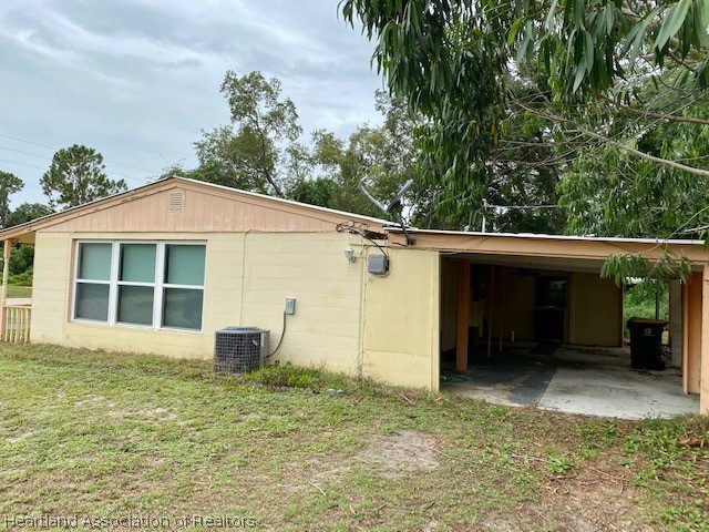 951 Lake June Road Lake Placid, FL 33852 - Photo 12 of 13 a view of a house with a yard