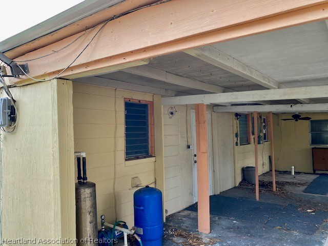 951 Lake June Road Lake Placid, FL 33852 - Photo 13 of 13 a view of an entryway with table and chair