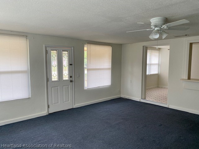 951 Lake June Road Lake Placid, FL 33852 - Photo 3 of 13 an empty room with windows and closet