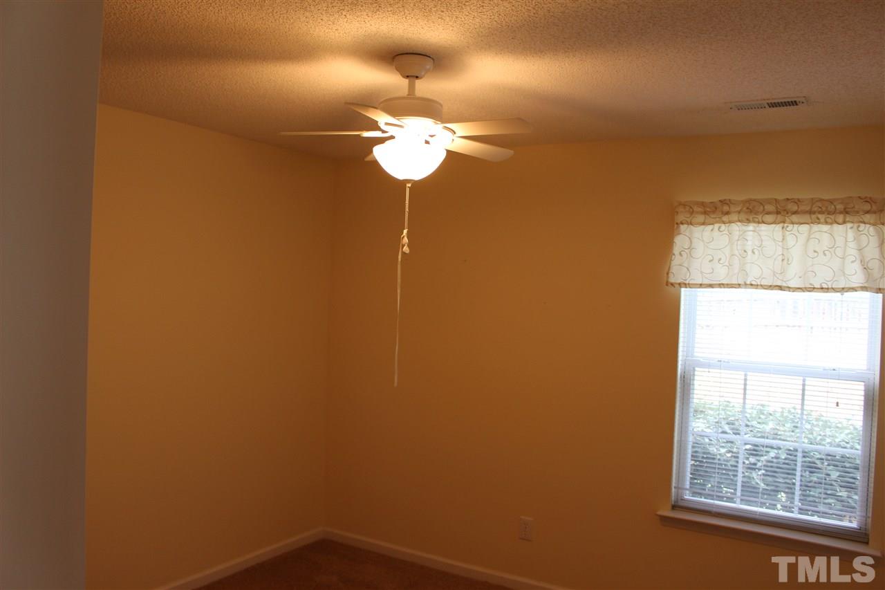 5002 Gable Ridge Drive Durham, NC 27713 - Photo 15 of 16 a view of a small space with a window