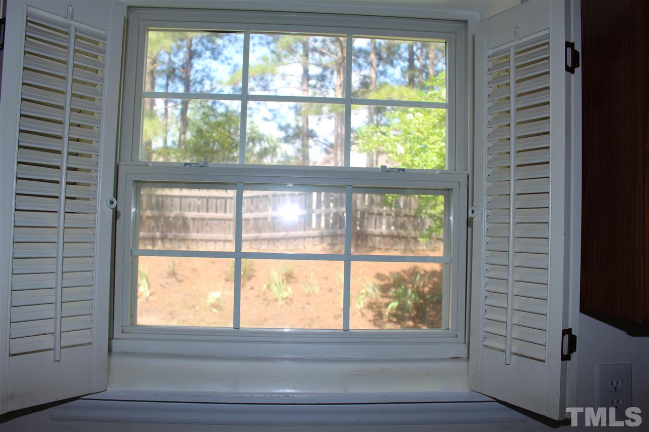 5002 Gable Ridge Drive Durham, NC 27713 - Photo 9 of 16 a view of an empty room with a window