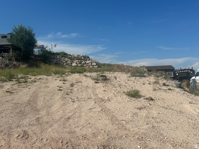 1141 Trapper Loop, Unit RV88 Garden City, UT 84028 - Photo 4 of 8 Sloping terrain with a visible rock retaining wall