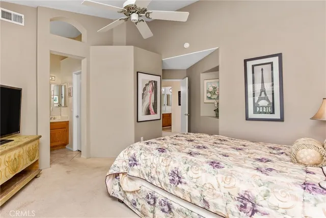 a bathroom with a double vanity sink mirror and double
