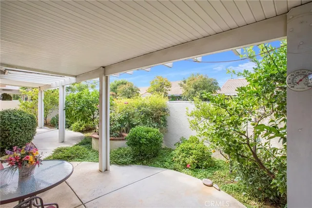 a house view with a garden space