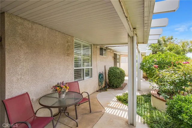 a view of a street with a building in the background